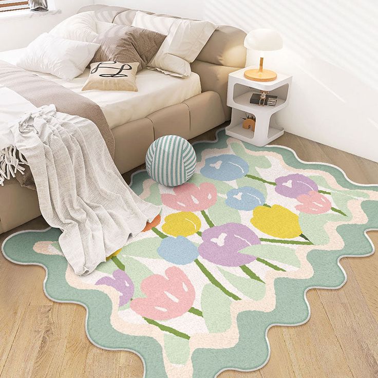 Pastel tulip shaped floor rug in soft pink and green tones
